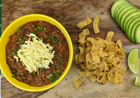 Vegan Chili with corn chips a vegan cheese