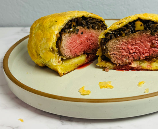 Beef tenderloin cooked medium rare with a duxell and puff pastry combining for a perfect weeknight beef wellington